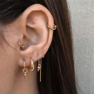 Close-up of Gal Earrings showcasing a unique hoop design with modern shapes for a subtle statement.