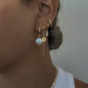 May Earrings Set featuring natural pearls and wildflower details, perfect for a playful look.