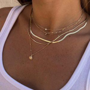Yam Necklace featuring layered double chains with a dainty charm, pearl, and beachy vibe.